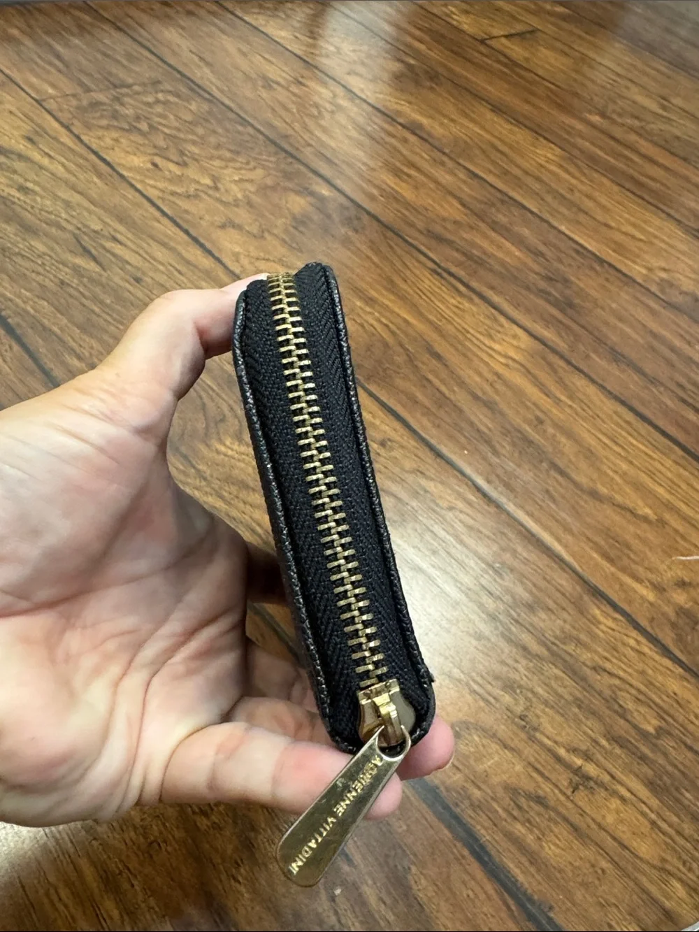 Adrienne Vittadini Black Zip Around Wallet Purple Interior Pebbled